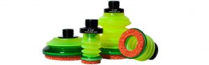 Cuatro ventosas color verde con espumas naranjas en los labios de la marca PIAB